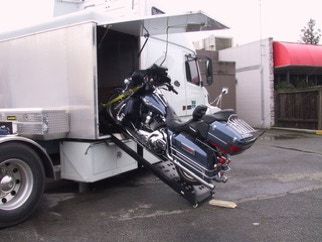 Motorcycle lift for truck hotsell